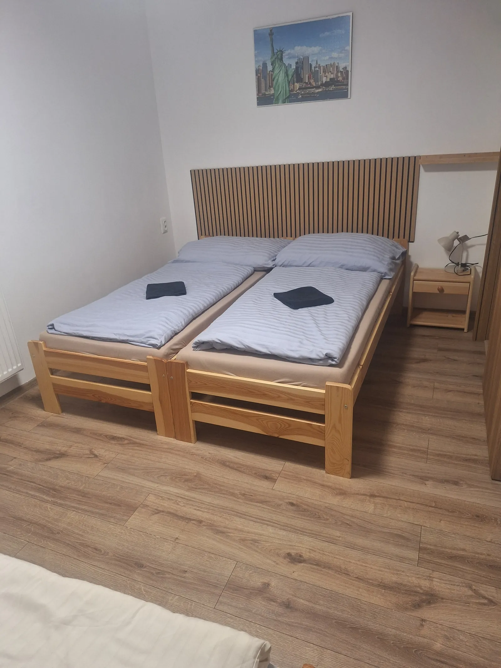 Dvojlôžková izba s obrazom mesta
